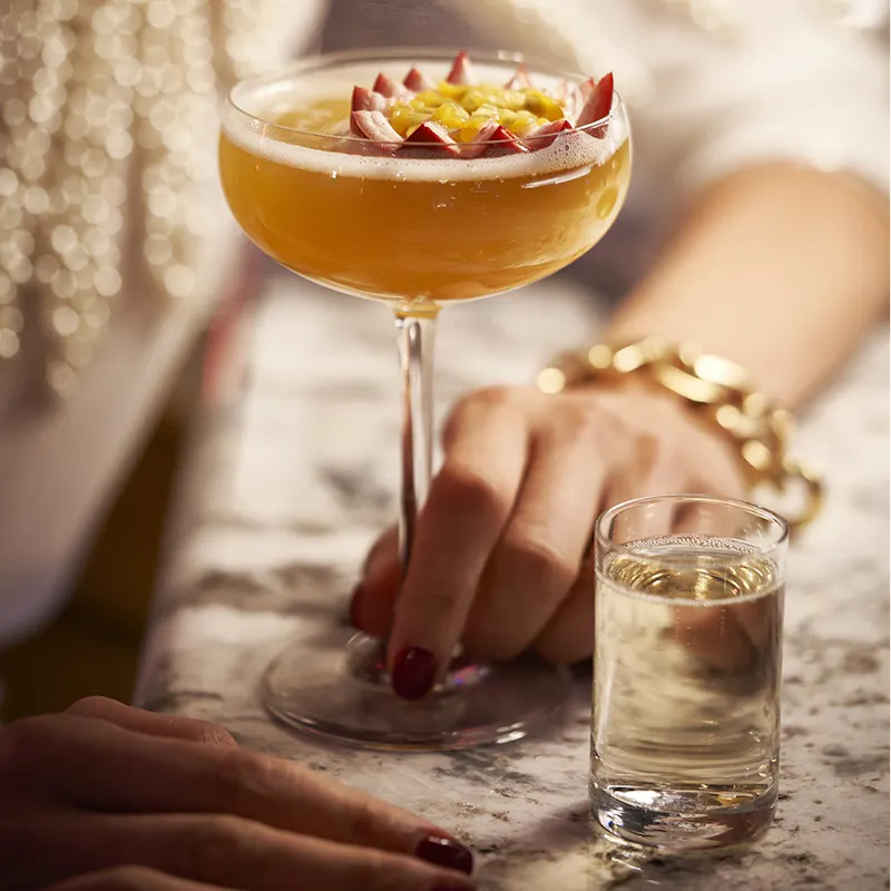 Pornstar Martini from Akai Brussels. Japanese-Mediterranean fusion restaurant with the best cocktail rooftop bar.