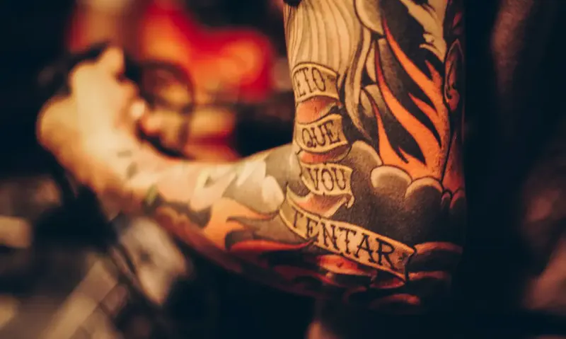 men's arm tattoo | Photo by Matheus Ferrero, on https://unsplash.com/@matheusferrero?utm_source=centralapp&utm_medium=referral
