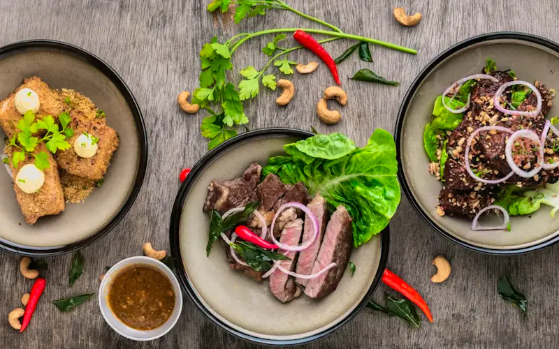Image of Tatsumi cooked dish on gray bowl | Photo by Lily Banse, on https://unsplash.com/@lvnatikk?utm_source=CentralApp&utm_medium=referral