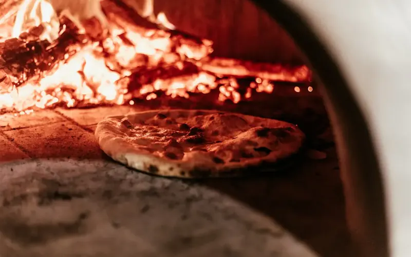 burning wood | Photo by Arthur Brognoli, on https://unsplash.com/@arthurbrognoli?utm_source=centralapp&utm_medium=referral