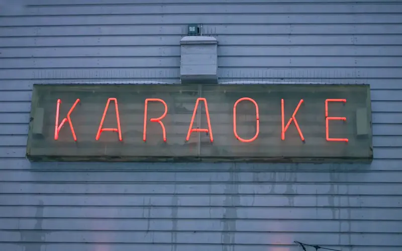 a neon sign on the side of a building | Photo by Aleksi Partanen, on https://unsplash.com/@aleksi_p?utm_source=centralapp&utm_medium=referral
