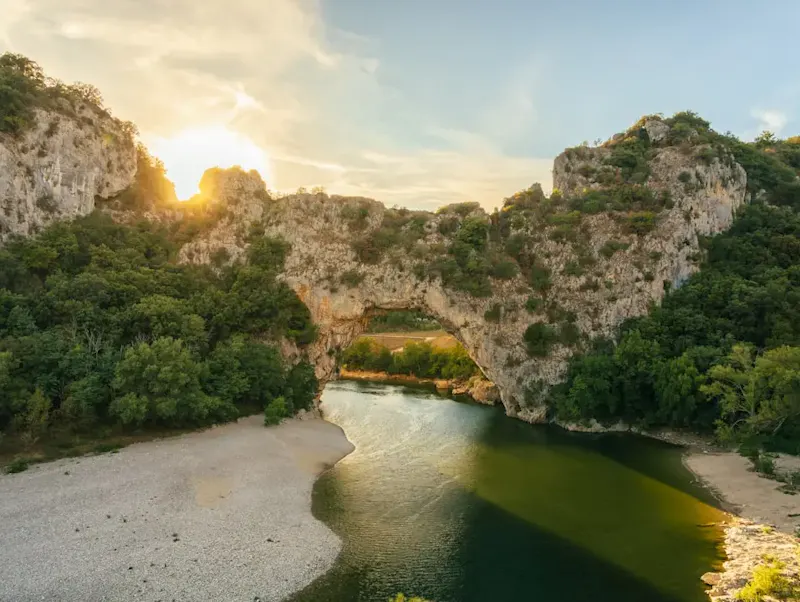 a river with trees and rocks | Photo by Thomas Bormans, on https://unsplash.com/@thomasbormans?utm_source=centralapp&utm_medium=referral