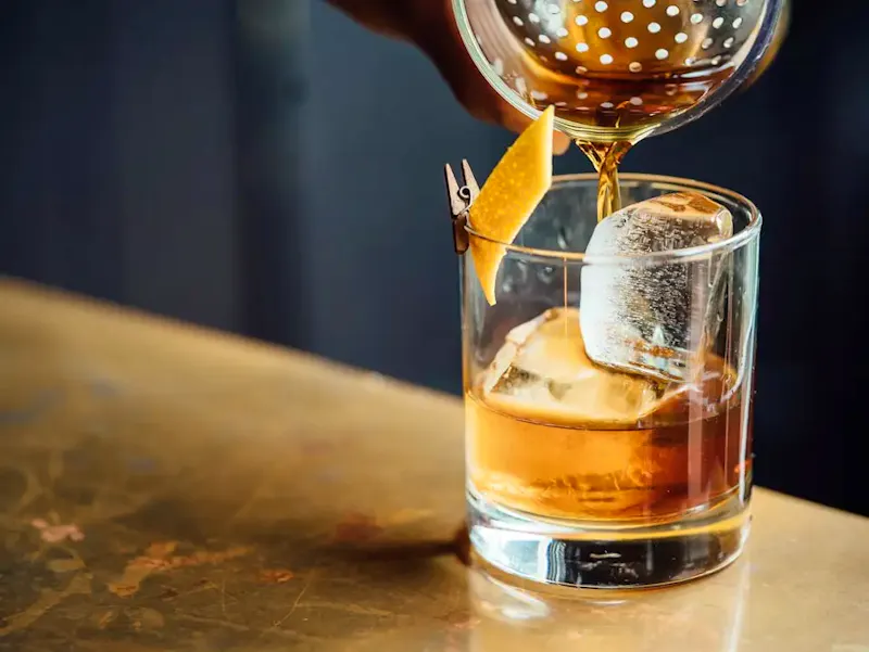 liquor pouring on clear shot glass | Photo by Adam Jaime, on https://unsplash.com/@arobj?utm_source=centralapp&utm_medium=referral