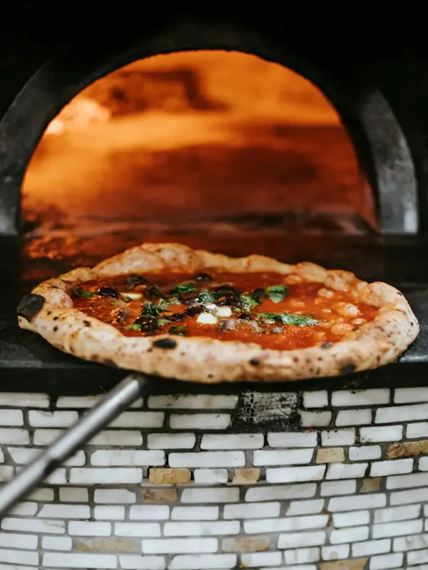 🍕 Descubre el auténtico sabor de nuestra pizza artesana